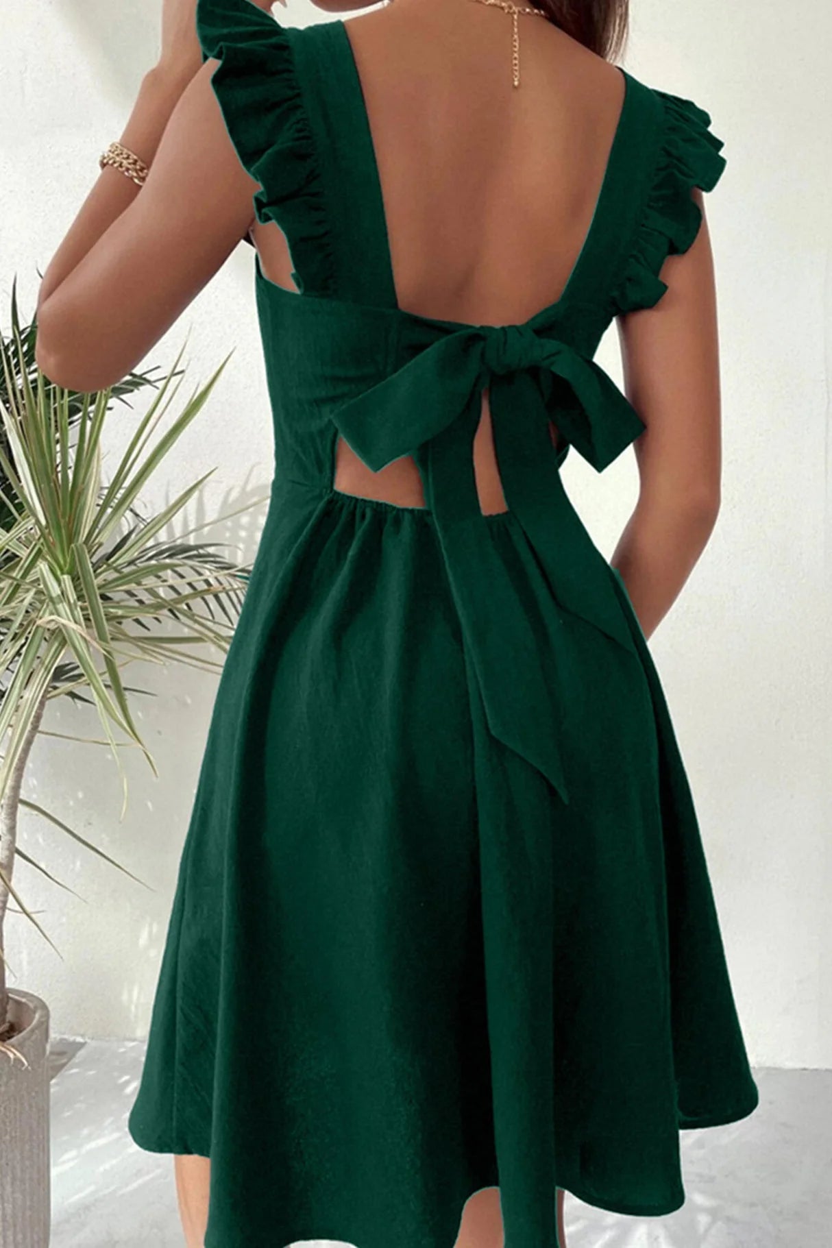 Ruffle Sleeveless Tie-back Mini Dresses