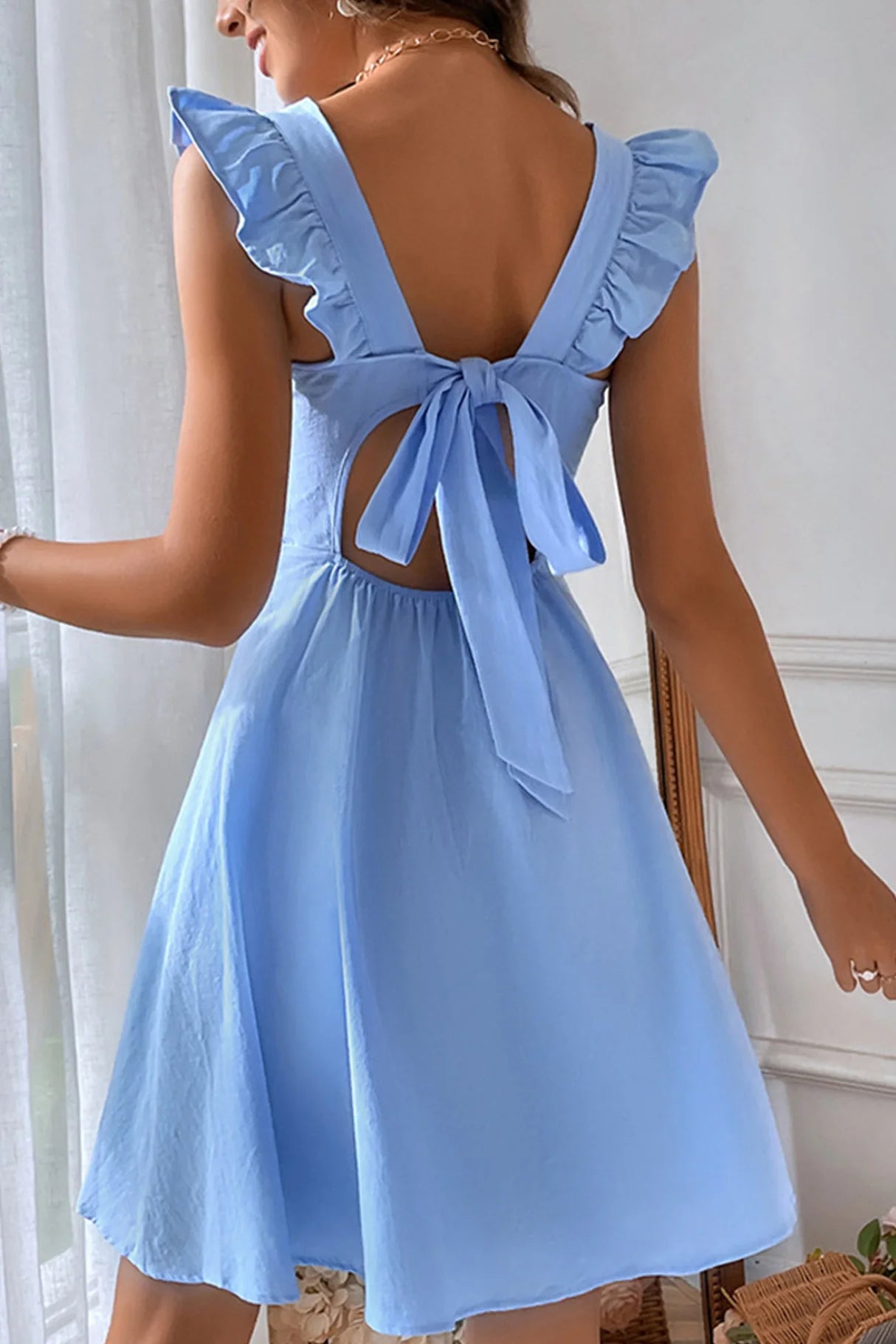 Ruffle Sleeveless Tie-back Mini Dresses
