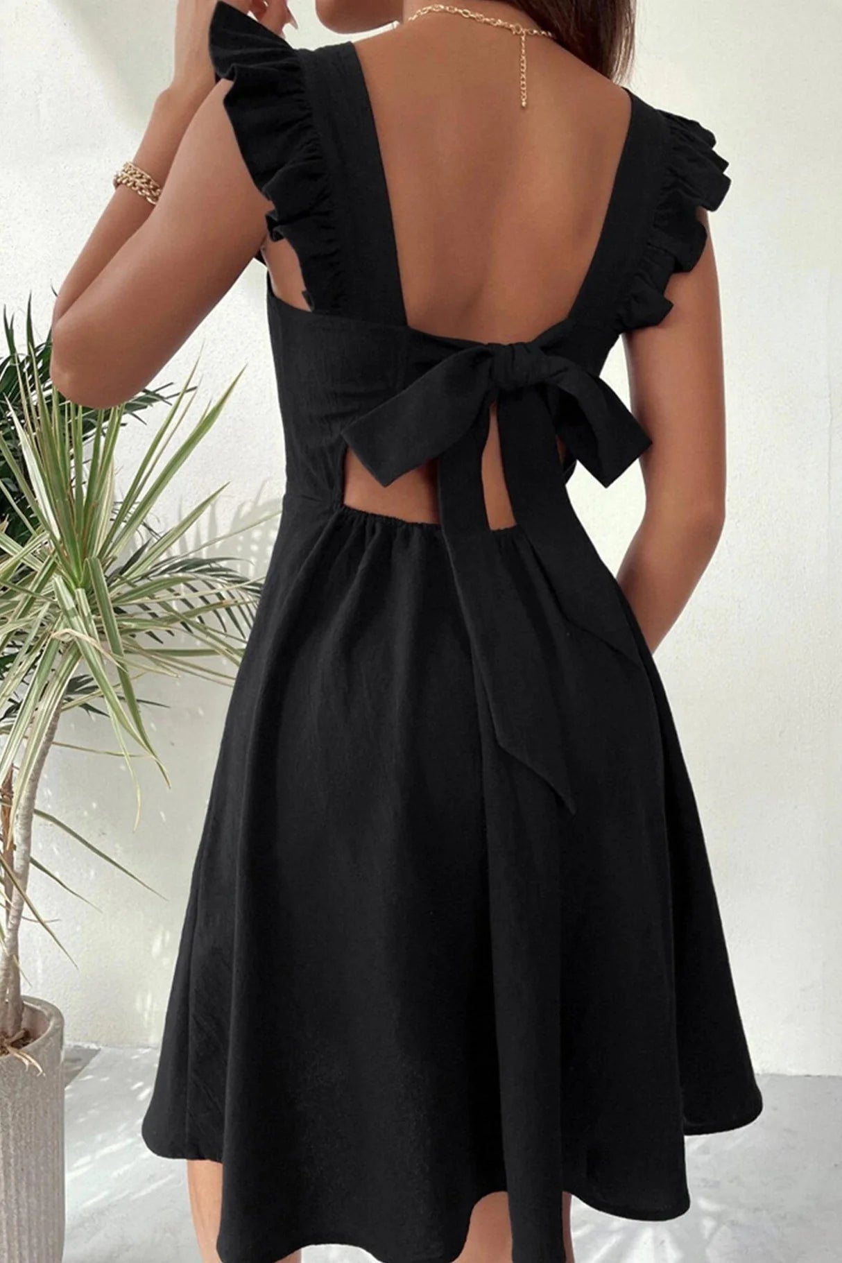 Ruffle Sleeveless Tie-back Mini Dresses